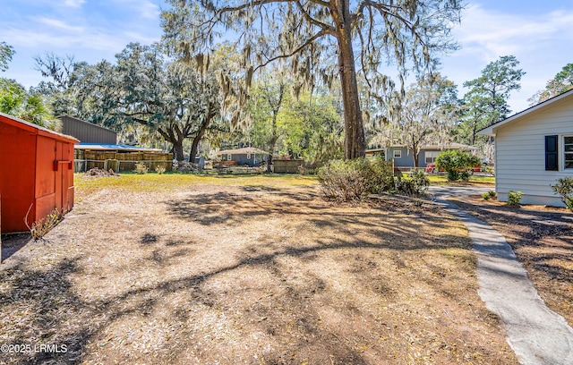 view of yard with fence