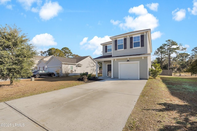 view of front property with a garage and a front lawn