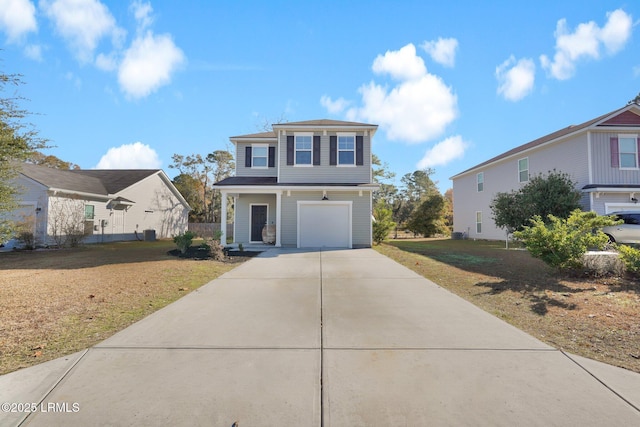 front facade featuring a garage and a front lawn