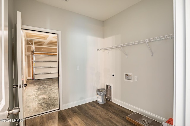 washroom with dark wood-type flooring, washer hookup, and electric dryer hookup