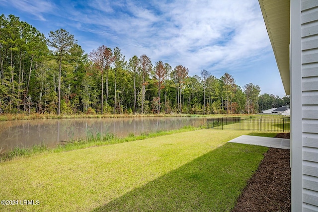 view of yard with a water view