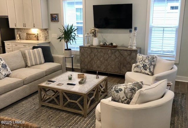 living room featuring dark hardwood / wood-style flooring