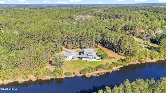 bird's eye view featuring a water view and a view of trees