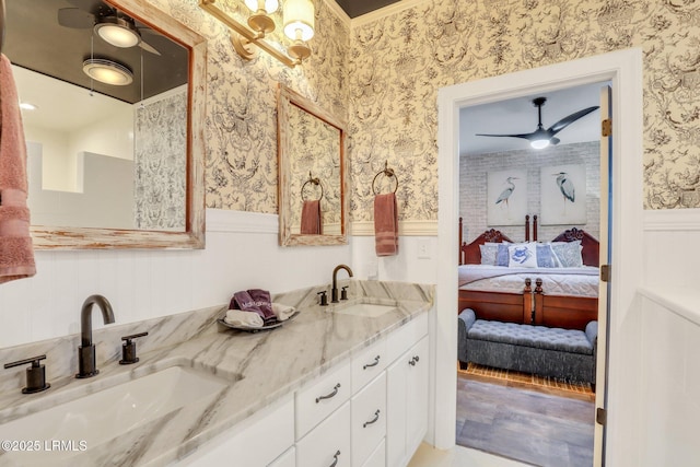 bathroom featuring vanity and ceiling fan