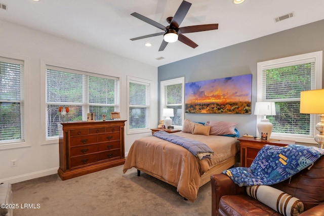 carpeted bedroom with ceiling fan