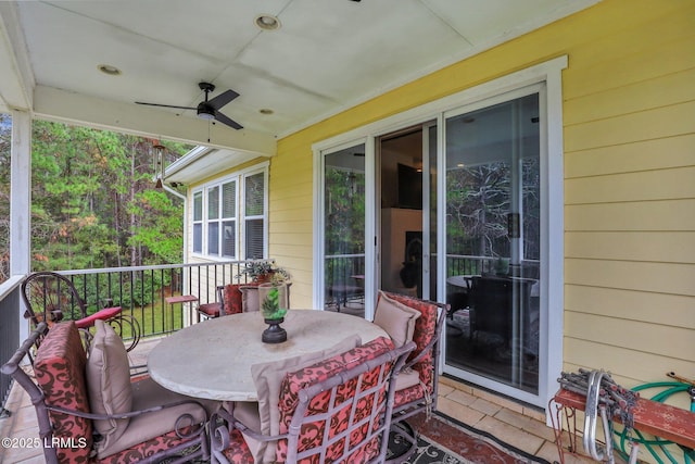 view of patio featuring ceiling fan