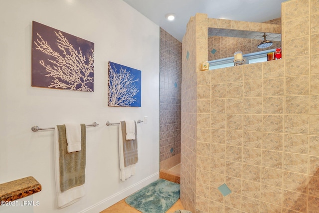 bathroom with tiled shower