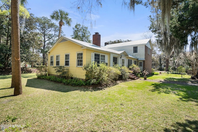 exterior space featuring a yard