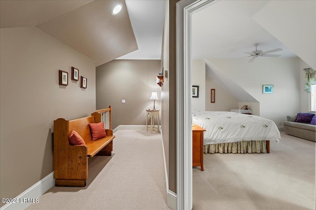 carpeted bedroom with ceiling fan and lofted ceiling