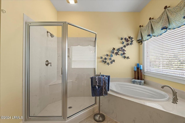 bathroom with independent shower and bath