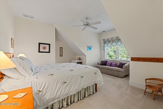 bedroom with light colored carpet and ceiling fan