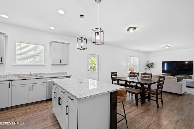 68 Keowee Ln, Beaufort, SC 29906 - kitchen featuring open floor plan, a kitchen breakfast bar, plenty of natural light, and wood finished floors