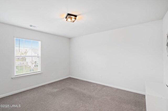 68 Keowee Ln, Beaufort, SC 29906 - empty room featuring carpet floors, baseboards, and visible vents