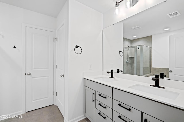 68 Keowee Ln, Beaufort, SC 29906 - bathroom with a sink, visible vents, baseboards, and a stall shower