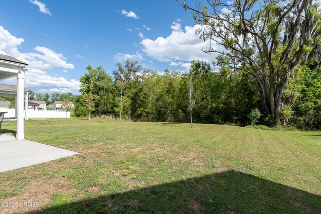 68 Keowee Ln, Beaufort, SC 29906 - view of yard featuring a patio area and fence