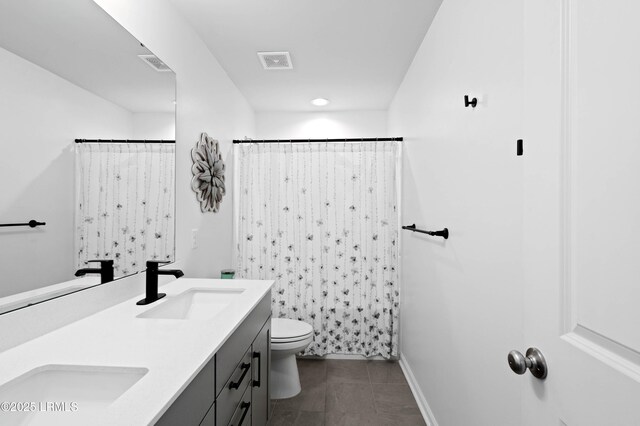 68 Keowee Ln, Beaufort, SC 29906 - full bath featuring double vanity, visible vents, a sink, and toilet