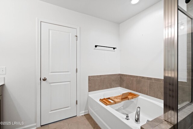 68 Keowee Ln, Beaufort, SC 29906 - bathroom featuring recessed lighting, tile patterned floors, a bath, and baseboards