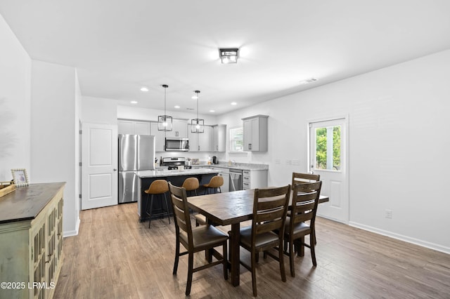 68 Keowee Ln, Beaufort, SC 29906 - dining room with recessed lighting, visible vents, light wood-type flooring, and baseboards