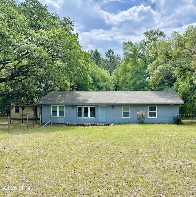 208 Squirrel Aly, Ridgeland, SC 29936 - ranch-style home featuring fence, brick siding, and a front yard