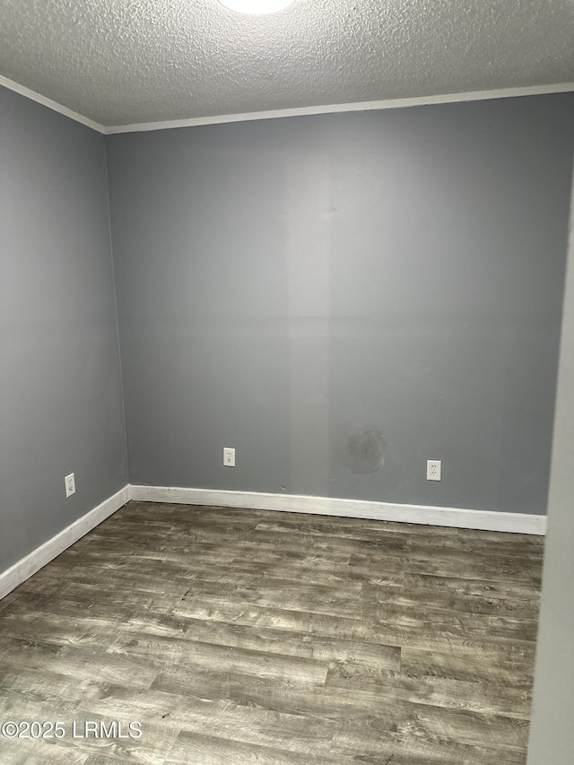 208 Squirrel Aly, Ridgeland, SC 29936 - spare room featuring wood finished floors, a textured ceiling, baseboards, and ornamental molding