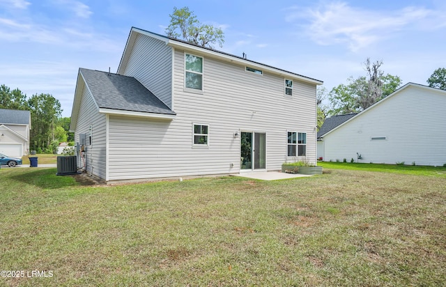 128 Teal Bluff Blvd, Seabrook, SC 29940 - back of house with a patio, a lawn, and roof with shingles