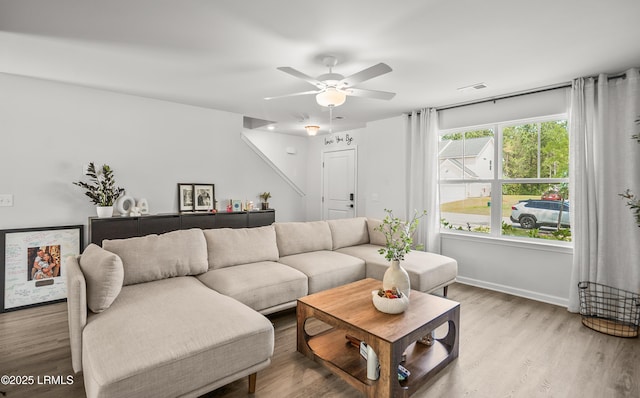 128 Teal Bluff Blvd, Seabrook, SC 29940 - living room with light wood-style floors and ceiling fan