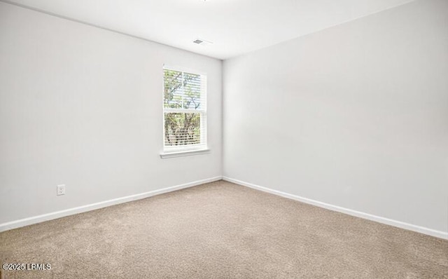 128 Teal Bluff Blvd, Seabrook, SC 29940 - empty room featuring carpet flooring and baseboards