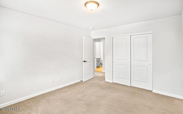 128 Teal Bluff Blvd, Seabrook, SC 29940 - unfurnished bedroom with carpet and a closet