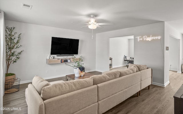 128 Teal Bluff Blvd, Seabrook, SC 29940 - living area featuring ceiling fan and wood finished floors