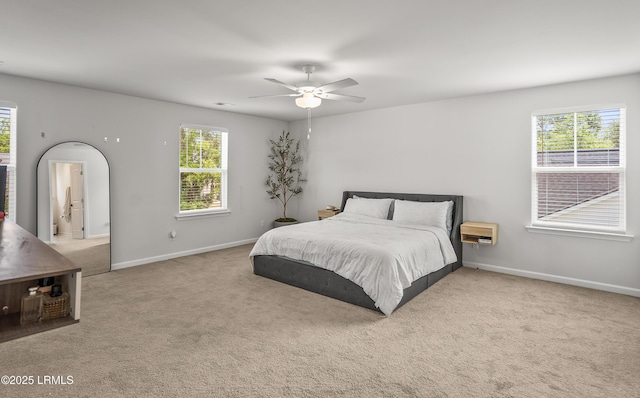 128 Teal Bluff Blvd, Seabrook, SC 29940 - bedroom with carpet flooring and a ceiling fan