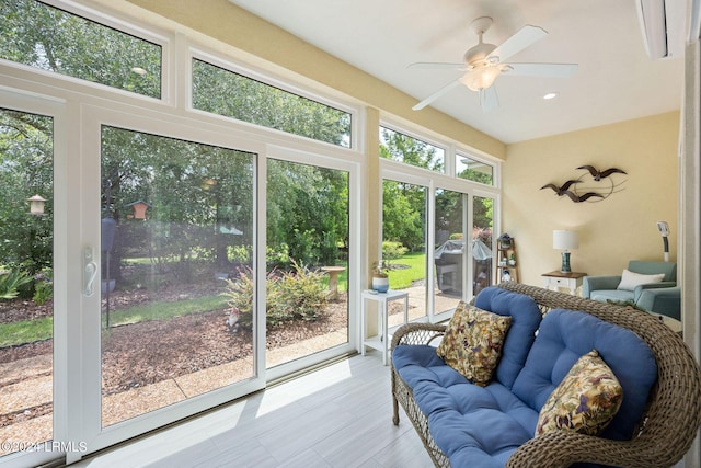 sunroom / solarium with ceiling fan