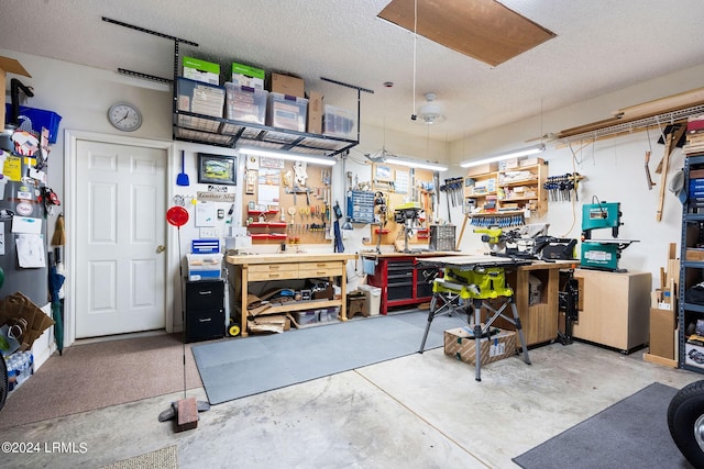 garage featuring a workshop area