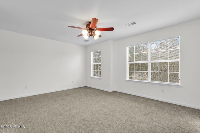 carpeted empty room with ceiling fan