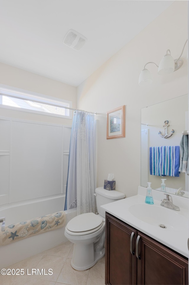 full bathroom featuring tile patterned flooring, vanity, shower / tub combo with curtain, and toilet