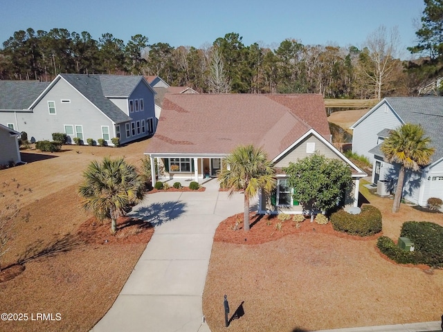 view of front of property featuring a carport