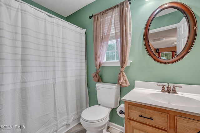 bathroom with a shower with shower curtain, toilet, and vanity