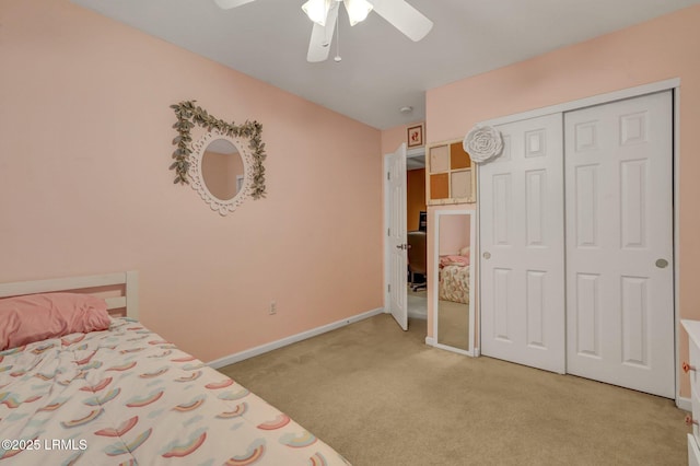 unfurnished bedroom with a closet, carpet flooring, ceiling fan, and baseboards