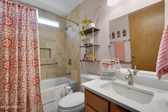 full bathroom with shower / tub combo with curtain, vanity, and toilet