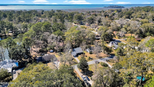 drone / aerial view featuring a view of trees