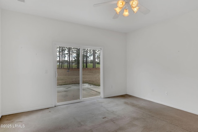 empty room with light colored carpet, ceiling fan, and baseboards