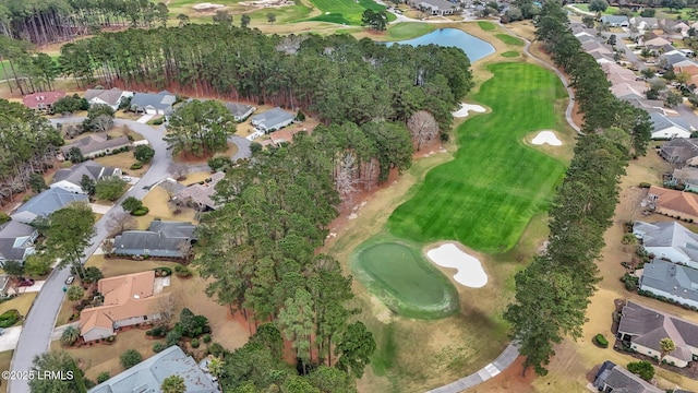 bird's eye view featuring a water view, a residential view, and golf course view