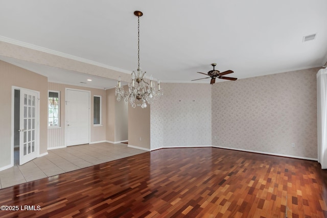 unfurnished room featuring wallpapered walls, baseboards, light wood finished floors, and crown molding