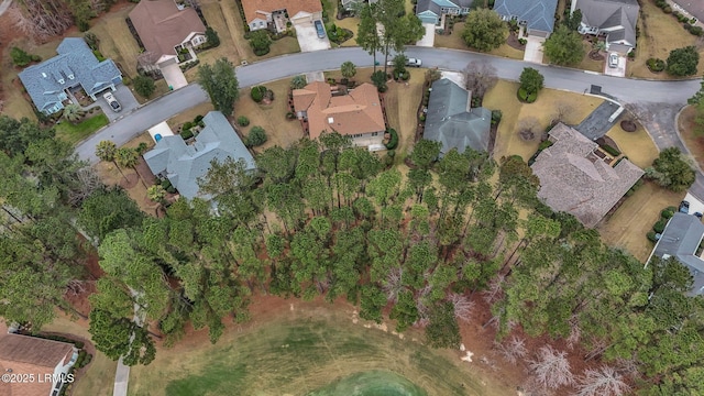 birds eye view of property with a residential view