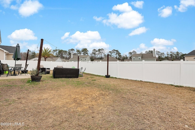 view of yard featuring outdoor lounge area and a patio