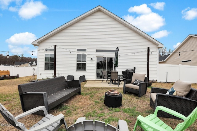 rear view of house featuring an outdoor hangout area and a patio area