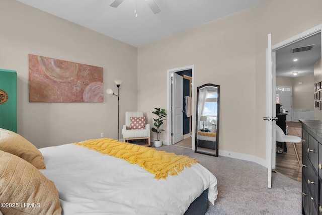 bedroom featuring ceiling fan and carpet floors