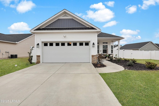 1836 Hearthstone Dr, Ridgeland, SC 29936 - view of front of home featuring stone siding, driveway, an attached garage, board and batten siding, and a porch