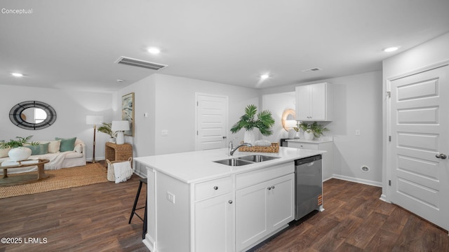 1595 Sanctum St, Ridgeland, SC 29936 - kitchen featuring a sink, dishwasher, recessed lighting, dark wood-type flooring, and white cabinetry