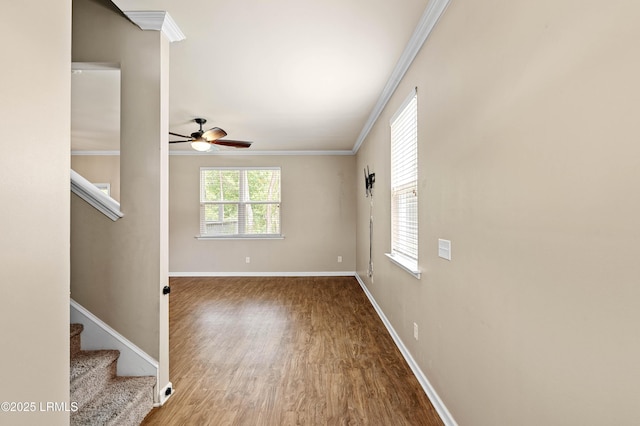 4944 Tidal Walk Ln, Beaufort, SC 29907 - spare room with crown molding, stairway, wood finished floors, and ceiling fan