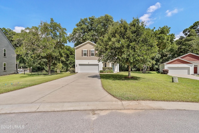 4944 Tidal Walk Ln, Beaufort, SC 29907 - view of front of house featuring driveway, a garage, a front lawn, and view of wooded area
